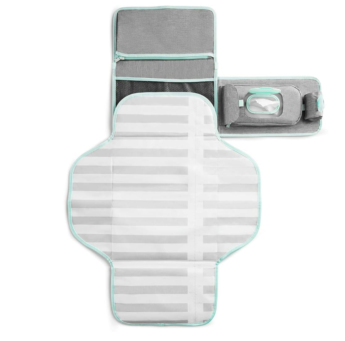 Gray and mint portable baby changing pad with built-in wipes dispenser, diaper pockets, and waterproof cushioned mat unfolded on white background.