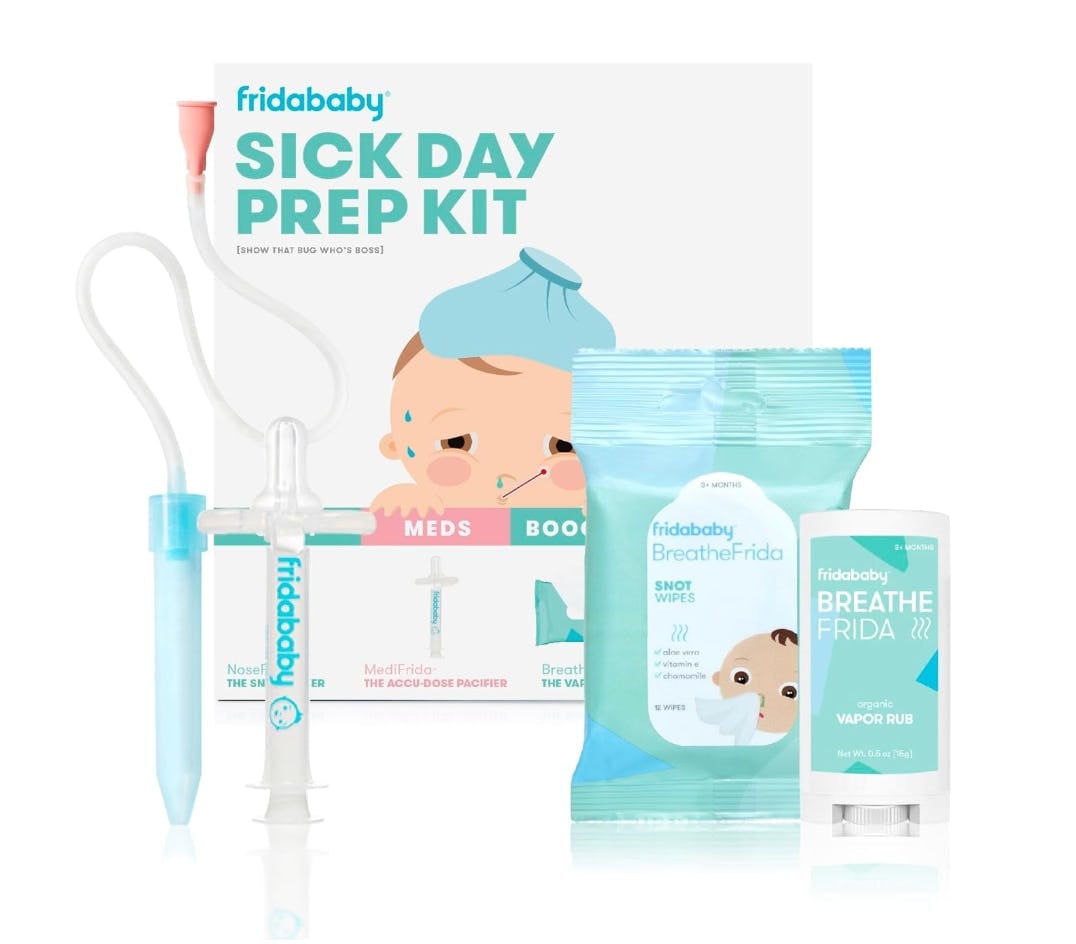 FridaBaby Sick Day Prep Kit with nasal aspirator, medicine pacifier, snot wipes, and vapor rub displayed with product box.
