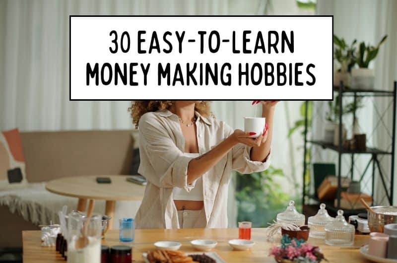 Person holding a white cup at a table with overlay text: 30 EASY-TO-LEARN MONEY MAKING HOBBIES