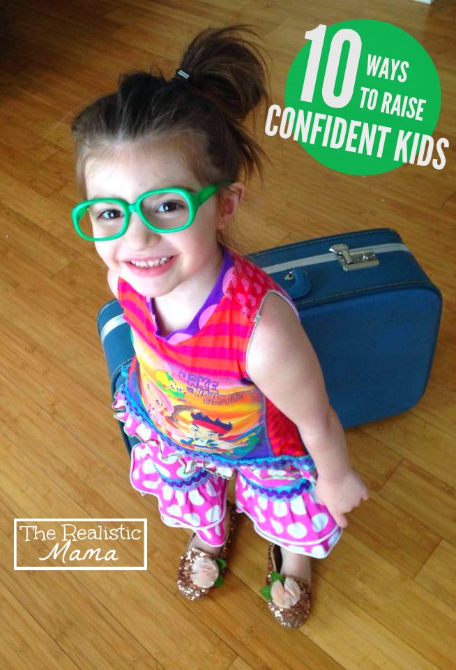 Smiling child in green glasses standing by a blue suitcase with text about raising confident kids.