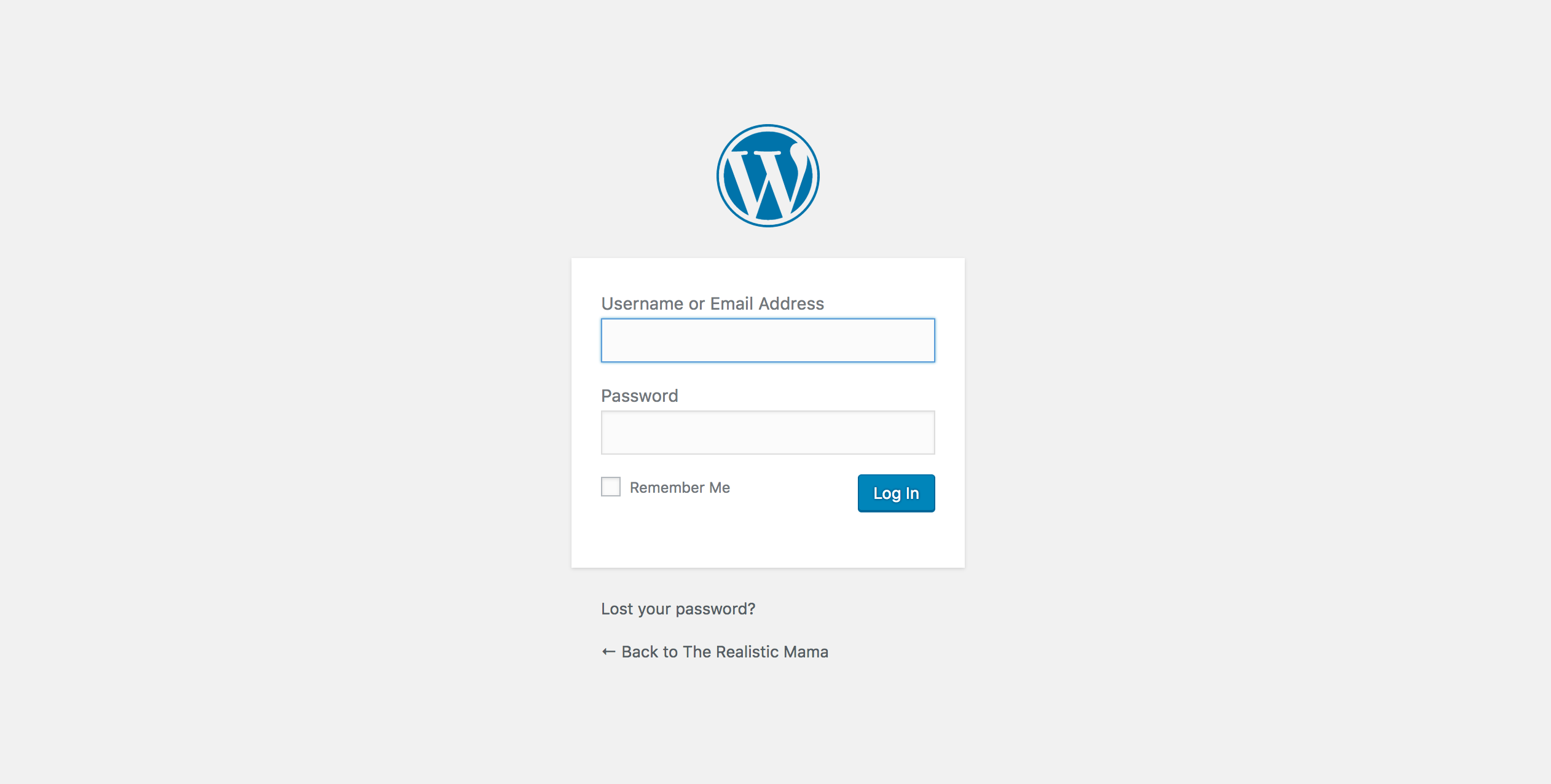 Login form with circular W logo, username and password fields, remember me checkbox, and log in button.