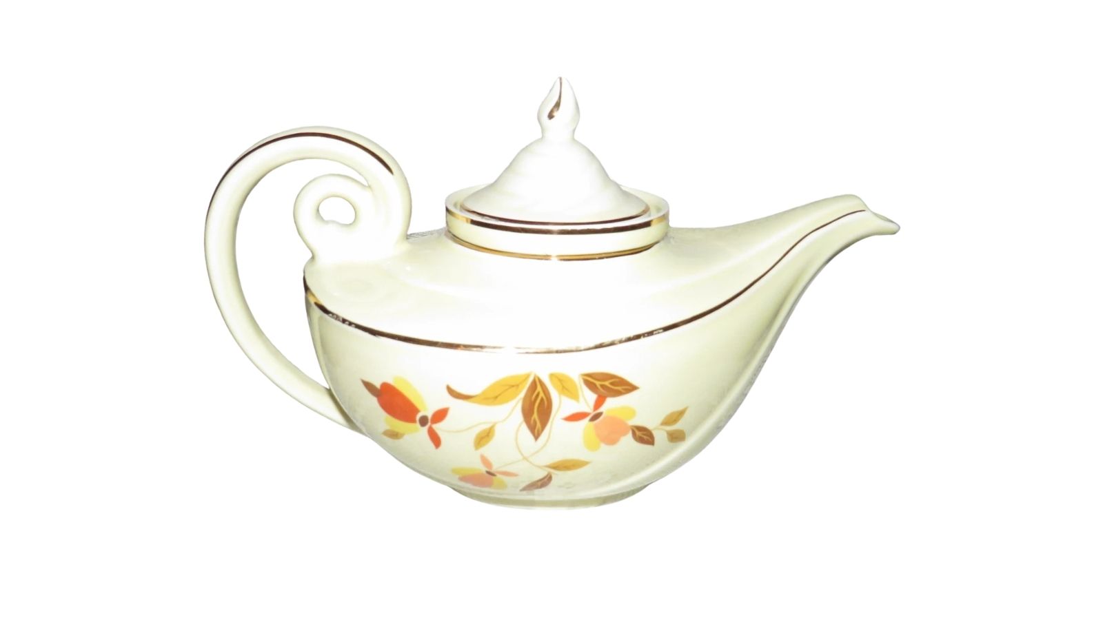 Cream-colored teapot with a curved handle, long spout, lid, gold trim, and orange leaf-and-flower decoration.