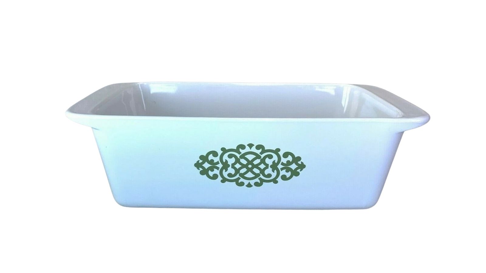 Light blue rectangular casserole dish with a green ornamental design on the front