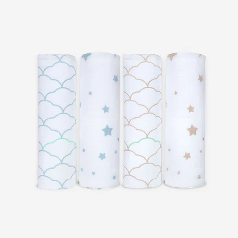 Four rolled white fabric wraps with teal and gold cloud and star patterns on a plain light background.