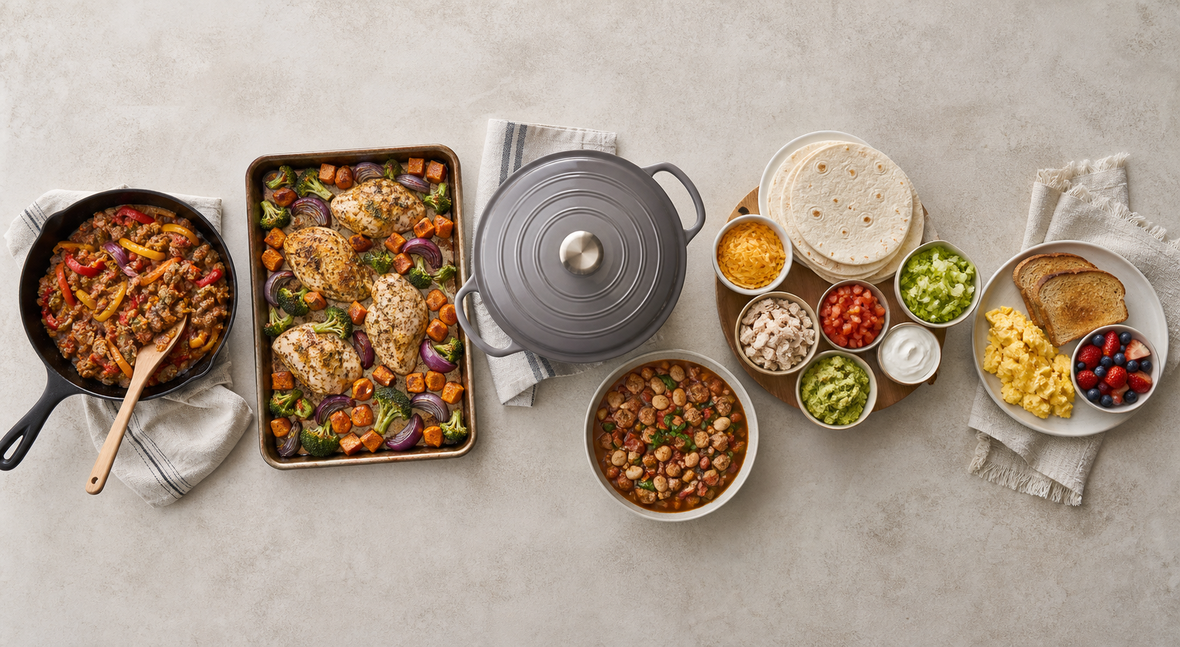 Five meal formats are arranged on a table, including a skillet meal, sheet-pan dinner, one-pot dish, taco spread, and eggs with toast and fruit.