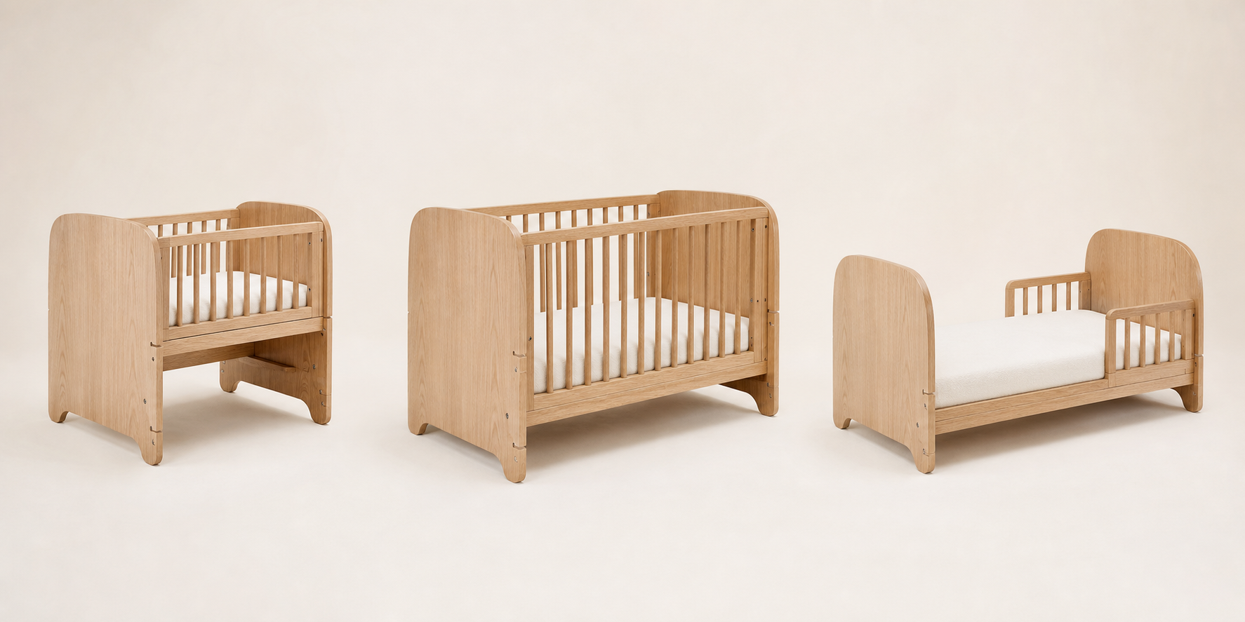 Three pale wood convertible bed configurations shown side by side, from a small newborn setup to a high-sided cot and a low junior bed.